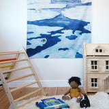 An organic cotton Frozen Land Arctic toy play cloth by Wonderie hung up in the Babipur playroom, you can also use is as a backdrop or play base, buy now at Babipur.
