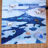 Wonderie Frozen Land organic cotton toy play cloth showing an arctic icy scene, use as a play base, back drop or wall hanging, paired with Lanka Kade figures, for sale at Babipur.
