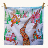 Wonderie Play Cloth - Gingerbread Lane, is a lovey sensory play cloth with 
a beautifully hand-illustrated festive scene, featuring a red brick path through a snowy village filled with enchanting gingerbread houses, with sugar icing roofs, candy canes lining the paths and snow-covered fir trees