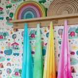 Wonderie organic cotton sheer large play cloths in green, blue, yellow and pink in the Babipur playroom.