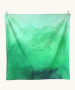 Wonderie organic cotton large sheer play cloth in juniper green to use as grass in spring and summer small world play.