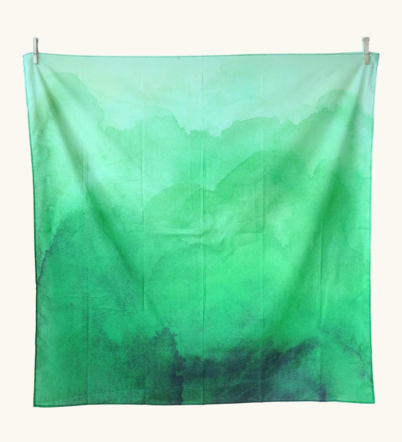 Wonderie organic cotton large sheer play cloth in juniper green to use as grass in spring and summer small world play.
