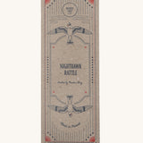 The outside of the Wooden Story Nighthawk Rattle cardboard box, decorated in a vintage inspired print, with two birds