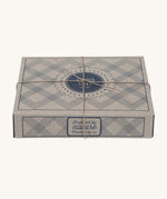 The cardboard decorative box for the Wooden Story Rattles, which comes beautifully wrapped in brown string. The perfect gift for little ones.