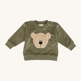 Wooly Organic embroidered sweater in tea leaf /savannah available at Babipur. A soft GOTS organic cotton jersey sweater in light green with a cute fluffy cream teddy bear on the front. Features popper fasteners on the shoulder for a easy fit