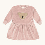 Wooly Organic embroidered velour dress in pale blush pink /savannah available at Babipur. A soft GOTS organic cotton velour sweater in light pink with a cute fluffy cream teddy bear on the front and elasticated arm cuffs 