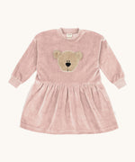 Wooly Organic embroidered velour dress in pale blush pink /savannah available at Babipur. A soft GOTS organic cotton velour sweater in light pink with a cute fluffy cream teddy bear on the front and elasticated arm cuffs 