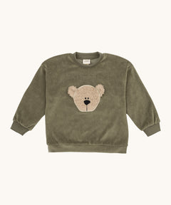 Wooly Organic embroidered velour sweater in tea leaf /savannah available at Babipur. A soft GOTS organic cotton velour sweater in light green with a cute fluffy cream teddy bear on the front.