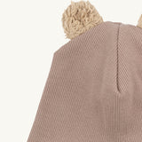 A close up of the Wooly Organic hat with teddy ears in pale blush / savannah available at Babipur showing the cute fluffy teddy bear ears detail