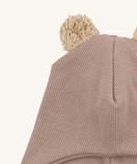 A close up of the Wooly Organic hat with teddy ears in pale blush / savannah available at Babipur showing the cute fluffy teddy bear ears detail