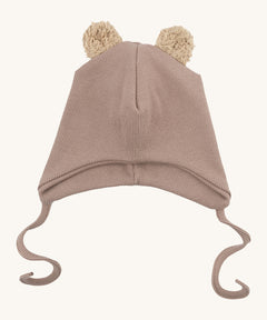 Wooly Organic hat with teddy ears in pale blush / savannah available at Babipur. A light pink GOTS organic hat in a soft ribbed style. Features ties and cute fluffy brown teddy bear ears