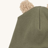 A close up of the Wooly Organic hat with teddy ears in tea leaf / savannah available at Babipur showing the cute fluffy teddy bear ears detail