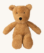 A small Wooly Organic soft teddy bear in brown available at Babipur. A soft cotton brown teddy bear with cute facial features