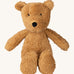 A small Wooly Organic soft teddy bear in brown available at Babipur. A soft cotton brown teddy bear with cute facial features