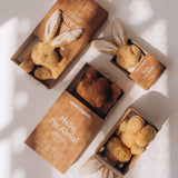 A collection of Wooly Organic soft cotton toys including the small light brown bunny rabbit toy, available at Babipur