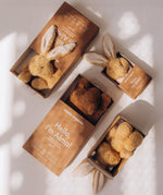 A collection of Wooly Organic soft cotton toys including the small light brown bunny rabbit toy, available at Babipur