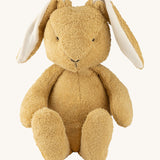 Wooly Organic soft bunny rabbit toy in light brown colour available at Babipur. A soft organic cotton bunny rabbit toy with floppy ears and cute facial features. 