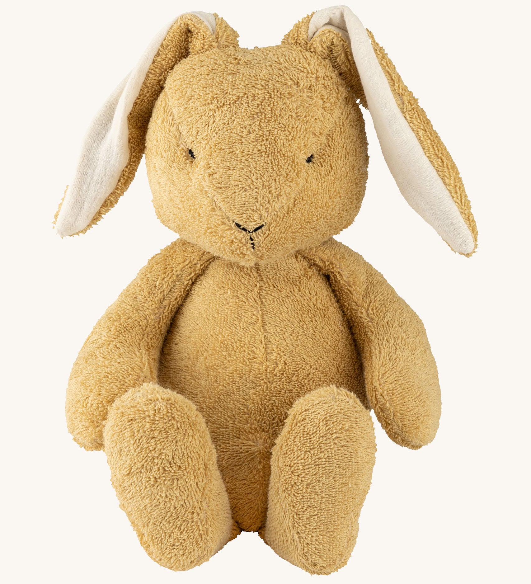 Wooly Organic soft bunny rabbit toy in light brown colour available at Babipur. A soft organic cotton bunny rabbit toy with floppy ears and cute facial features. 
