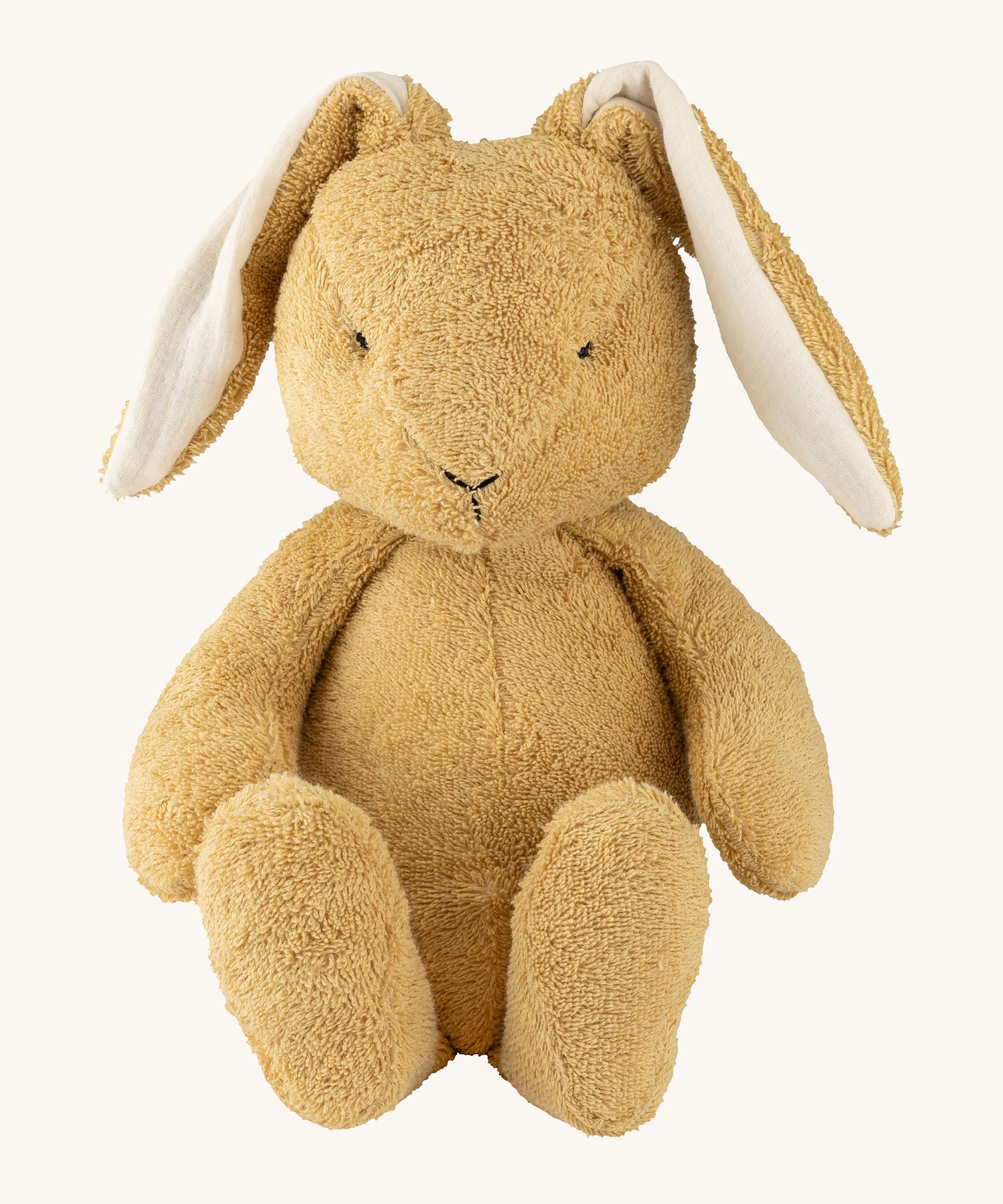 Wooly Organic soft bunny rabbit toy in light brown colour available at Babipur. A soft organic cotton bunny rabbit toy with floppy ears and cute facial features. 