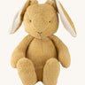 Wooly Organic soft bunny rabbit toy in light brown colour available at Babipur. A soft organic cotton bunny rabbit toy with floppy ears and cute facial features. 