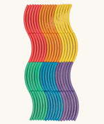 Set of 72 Abel curved wooden blocks in rainbow colors, including yellow, orange, red, purple, blue and green placed in a wavy pattern. 12 blocks in each colour. 