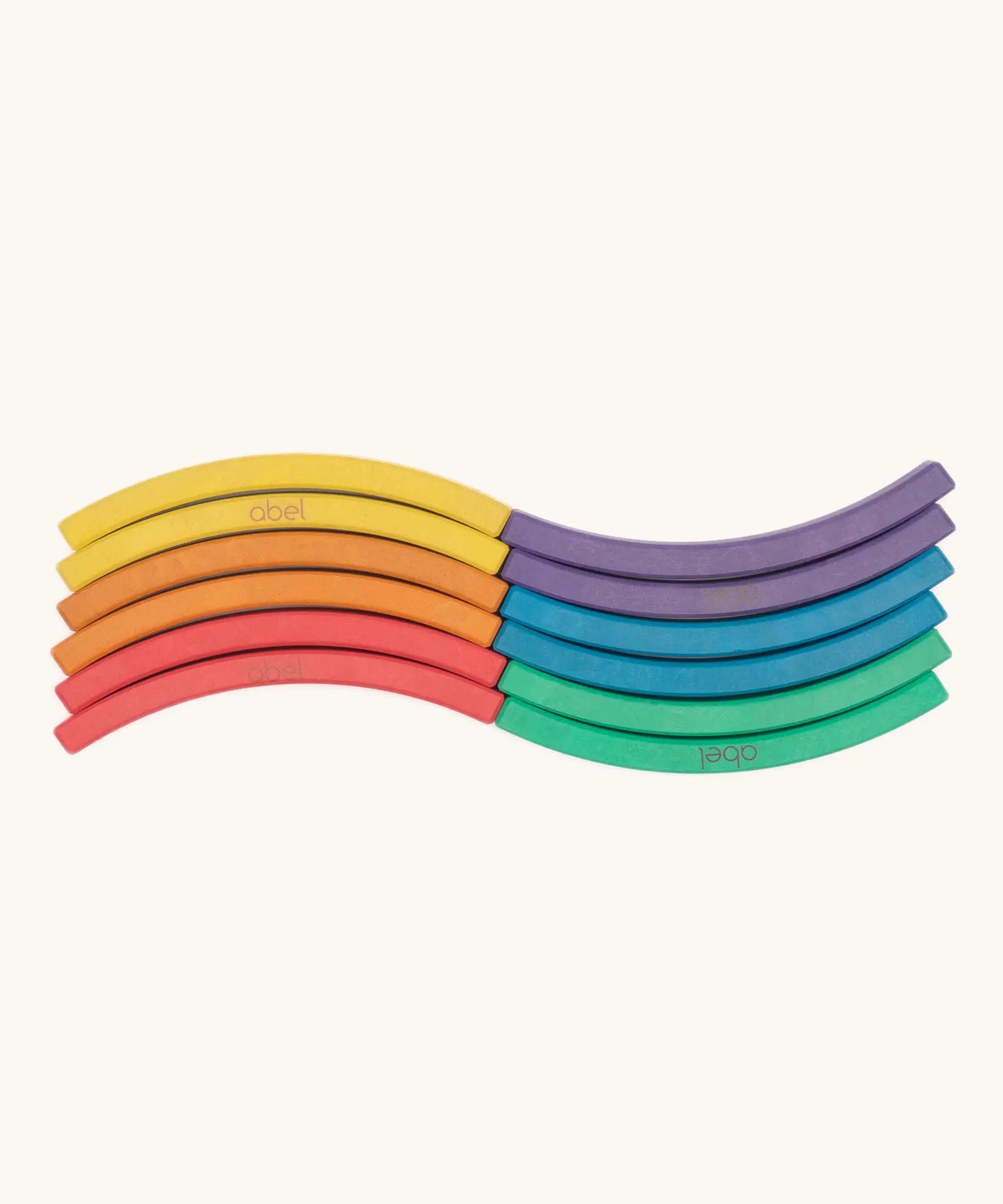 Set of 12 Abel curved wooden blocks in rainbow colors, including yellow, orange, red, purple, blue and green arranged in a wavy pattern.
