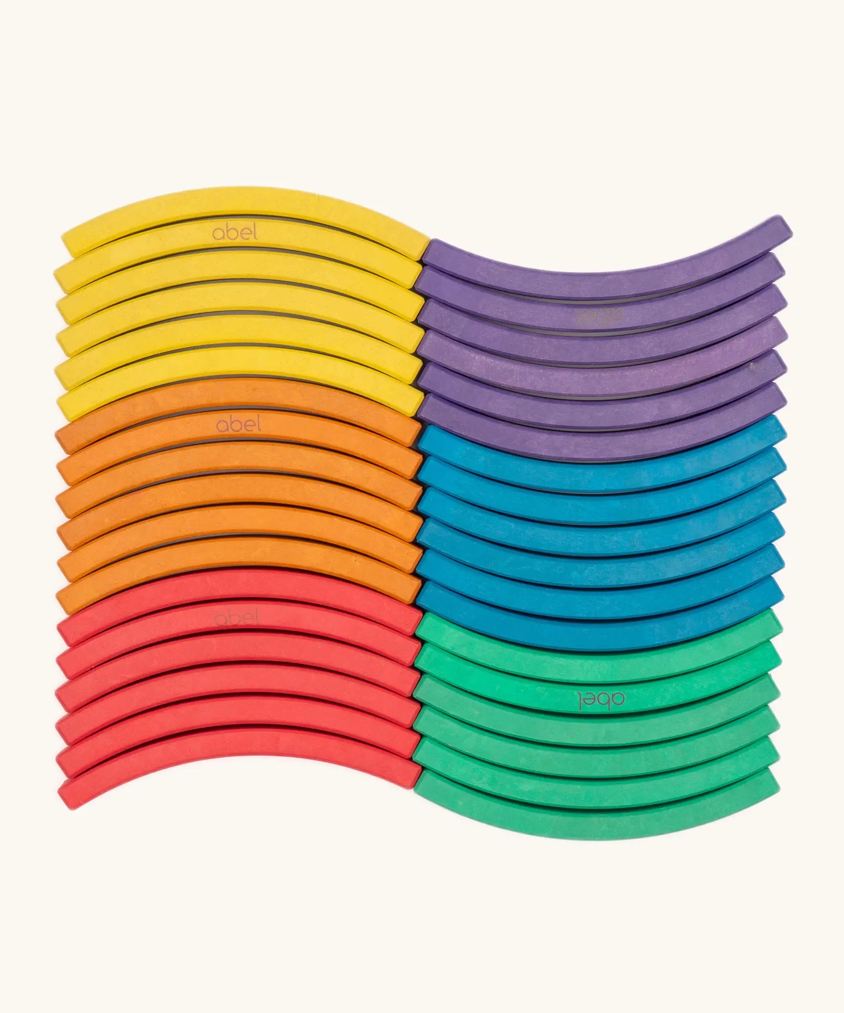 Set of 36 Abel curved wooden blocks in rainbow colors, including yellow, orange, red, purple, blue and green arranged in a wavy pattern. 6 blocks in each colour. 