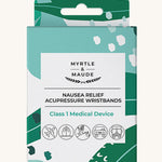 Green and blue acupressure box on a cream background