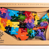 Alphabet Jigsaw Map of USA handmade wooden jigsaw puzzle in its recyclable cardboard box on a white background