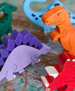 All Alphabet Jigsaws handmade wooden dinosaur figures with magnets, used in small-world play. 