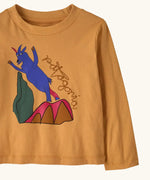 Front of Patagonia's  little kids long sleeve t-shirt in mango orange showing close up of  blue mountain goat print 