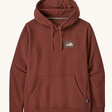 Patagonia Fitz Roy uprisal adult hoody. A burnt red coloured hoodie which features a adjustable drawstring on the hood and a pouch pocket on the front. Also features a brand patch l on the left chest