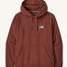 Patagonia Fitz Roy uprisal adult hoody. A burnt red coloured hoodie which features a adjustable drawstring on the hood and a pouch pocket on the front. Also features a brand patch l on the left chest