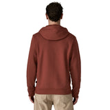 The back of a man wearing the wearing the Patagonia Fitz Roy uprisal adult hoody in dried vanilla colour available at Babipur.