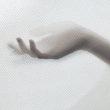 A hand behind the Ergobaby Mesh Aura Wrap in Grey