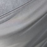  and shows how the wrap is tied around the back