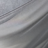  and shows how the wrap is tied around the back