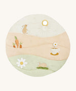 A wild chamomile Avery Row activity play mat with a rabbit, carrot a teacup and flower on top of the play mat on a cream background.