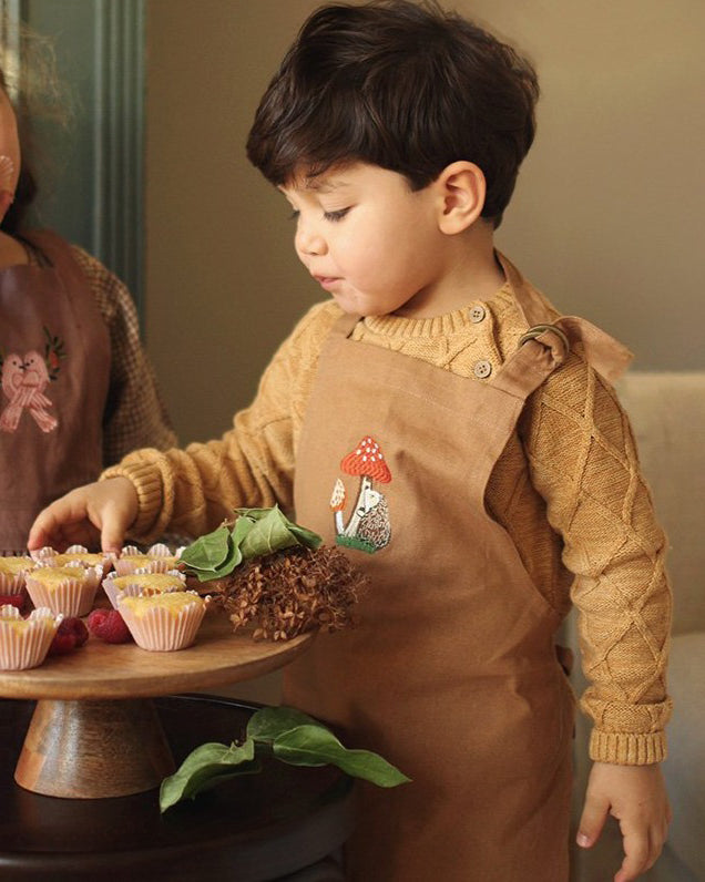 Avery Row Kid's Apron - Woodland Hedgehog. A beautiful light brown cotton canvas apron with a detailed