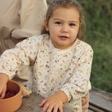 Avery Row Sleeved Bib - Grasslands