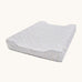 A light blue Avery Row changing pillow with a nature design on a cream background.