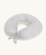 A soft light blue Avery Row nursing pillow with a nature design on a cream background.