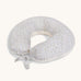 A soft light blue Avery Row nursing pillow with a nature design on a cream background.