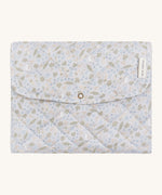 A soft light blue coloured Avery Row travel changing mat with a nature design on a cream background.