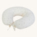 A soft light coloured Avery Row nursing pillow with a nettle design on a cream background.