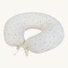 A soft light coloured Avery Row nursing pillow with a nettle design on a cream background.