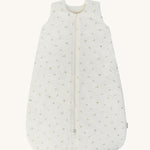 A light Avery row baby sleeping bag with a nettle design on the front on a cream background.