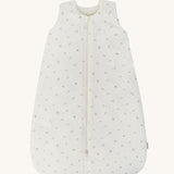 A light Avery row baby sleeping bag with a nettle design on the front on a cream background.