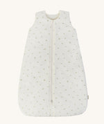 A light Avery row baby sleeping bag with a nettle design on the front on a cream background.
