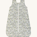 A Avery row baby sleeping bag with a flower design on the front on a cream background.